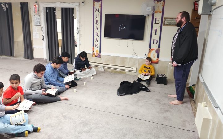 Children participating in an Arabic lesson at Dar Ussalam